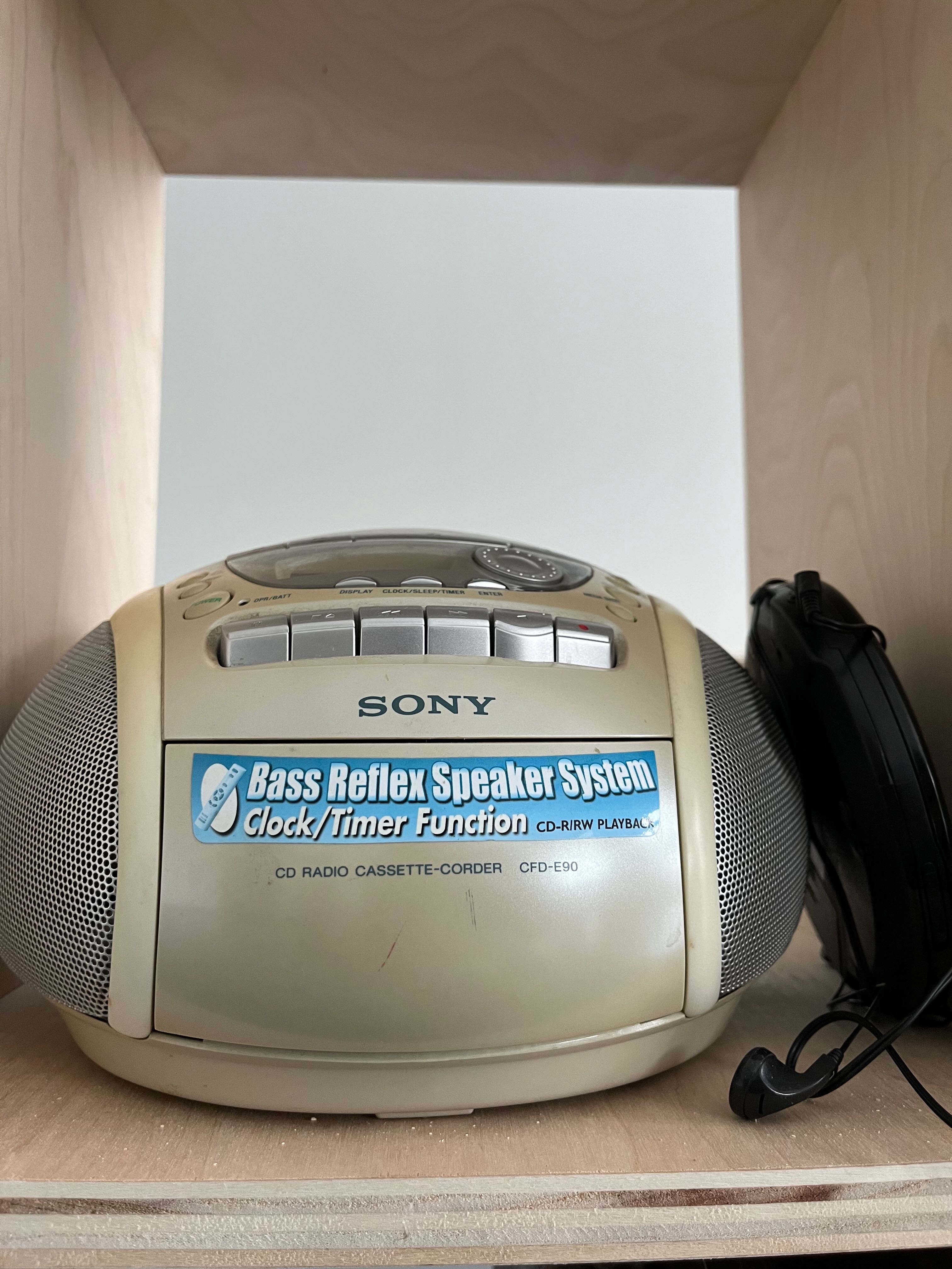 Image of an old Sony Bass Reflex Speaker System and a portable CD player